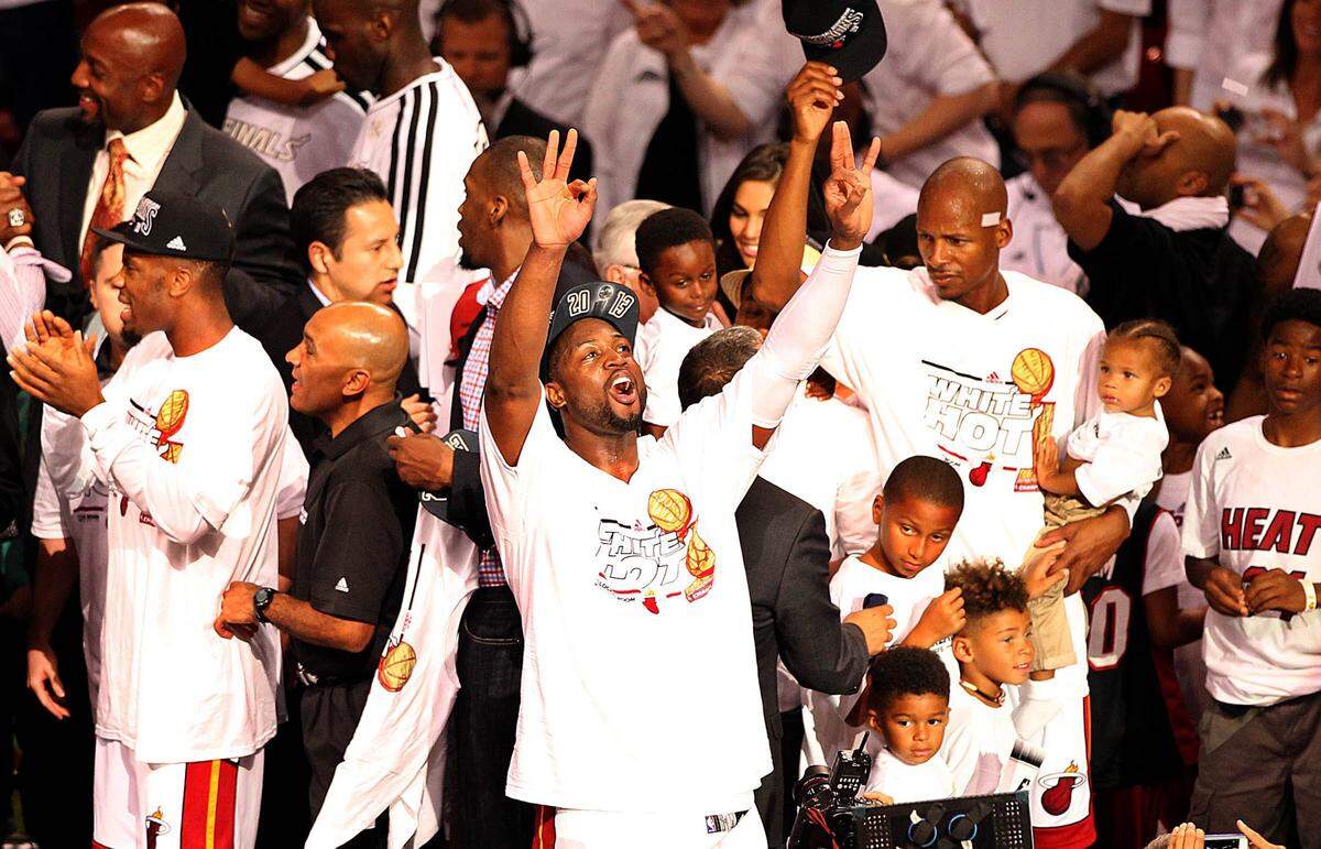 Miami Heat’s Dwyane Wade looks up as they celebrate after defeating San Antonio Spurs in Game 7 of the 2013 NBA Finals at AmericanAirlines Arena in Miami on Thursday, June 20, 2013.