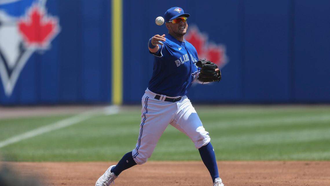 Toronto Blue Jays third baseman Joe Panik (2) throws to first during the third inning of a baseball game against the Baltimore Orioles in Buffalo, N.Y., Sunday, June 27, 2021. (AP Photo/Joshua Bessex)