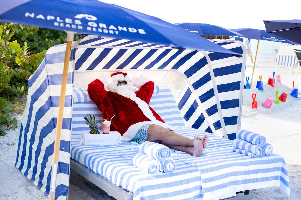 Even Santa loves to relax at the Naples Grande Beach Resort.