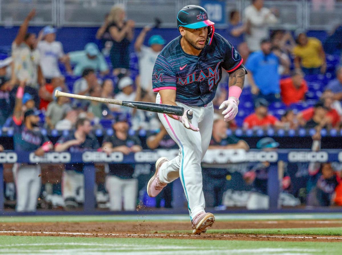 Miami Marlins catcher Agustín Ramírez (50) hits a single to bring in Javier Sanoja (46) and and Xavier Edwards (9) in the 9th inning as the Marlins defeat the Milwaukee Brewers at loanDepot park Miami, Florida on Saturday, July 5, 2025.