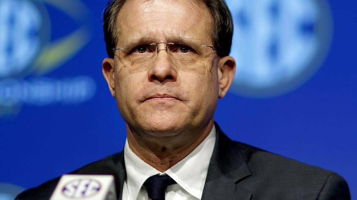Auburn head coach Gus Malzahn listens to a question during an NCAA college football news conference for the SEC championship game against Georgia in Atlanta, Friday, Dec. 1, 2017. (AP Photo/David Goldman)