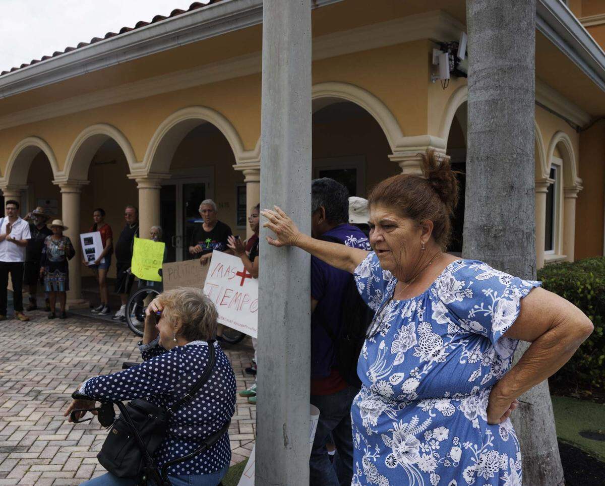 during a protest outside of Miami District 4 Commissioner Ralph Rosado's office on Wednesday, May 27, 2026, at Coral Gate Park in Coral Gables, Fla. 