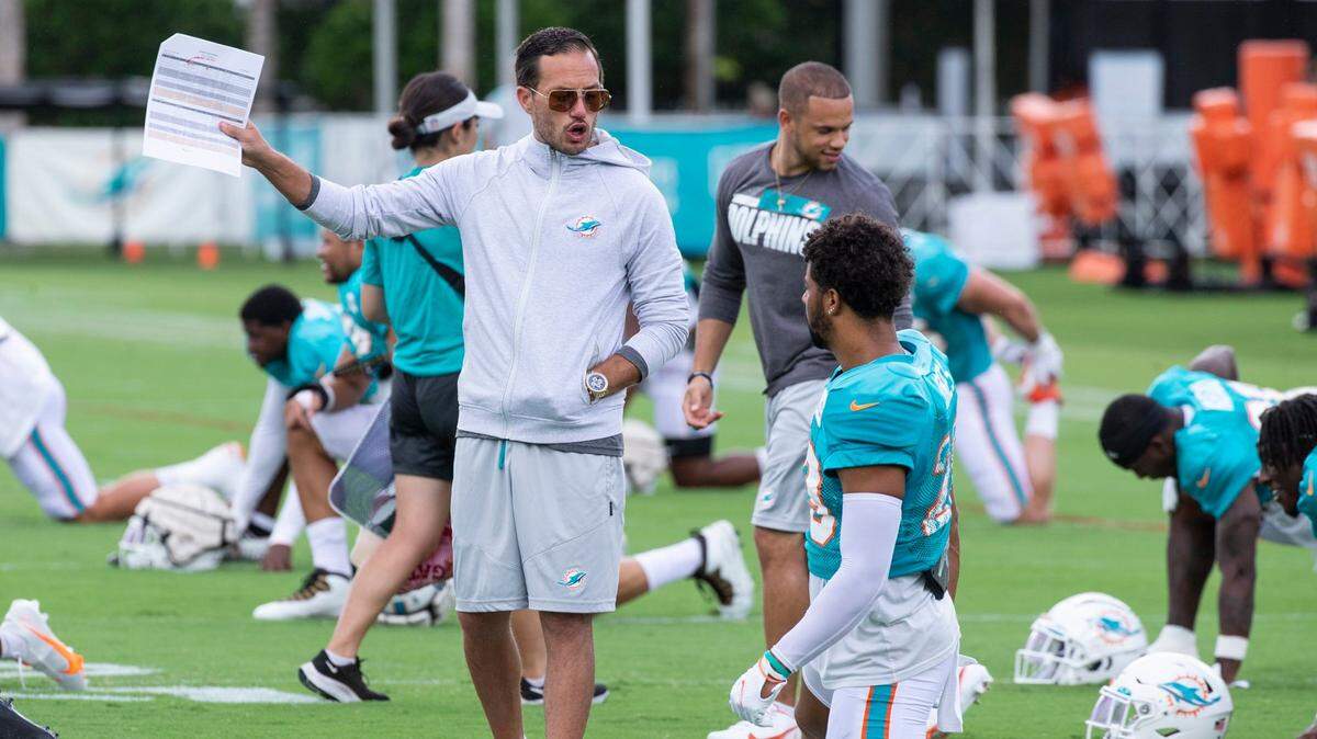 Miami Dolphins coach Mike McDaniel talks with Brandon Jones (29) during practice at Baptist Health Training Complex in Miami Gardens on Wednesday, August 3, 2022.