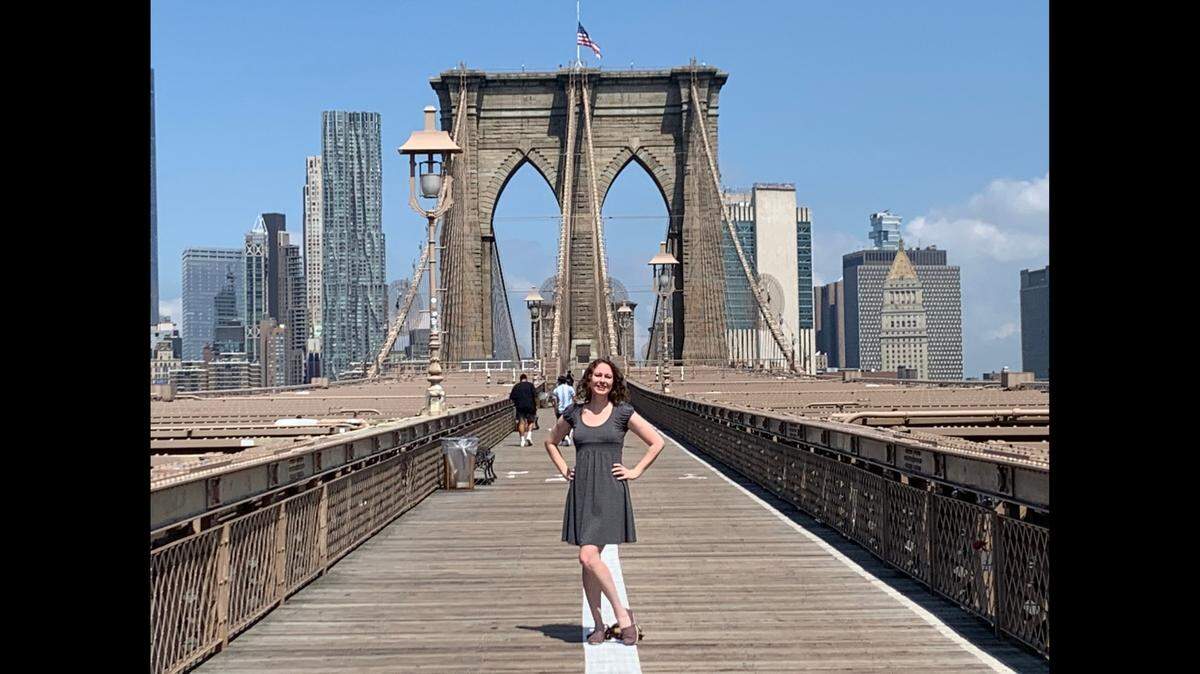 Amelia Stansberry, an ICU nurse with NuWest Healthcare Staffing, stood on the Brooklyn Bridge during a break from her work at a New York City hospital last month. She started working in Miami this week at Baptist Health South Florida as part of the corps of travel nurses contracted to provide reinforcements to Florida hospitals.