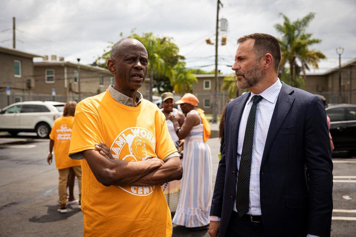 David Peery, left, founder of Miami Coalition to Advance Racial Equity, talks to Jeff Hearne, Director of the Tenant’s Rights Clinic and the attorney representing some of the tenants, during a press conference outside of the Lincoln Fields Apartments on Tuesday, May 23, 2023, down the street from Liberty Square in Miami.