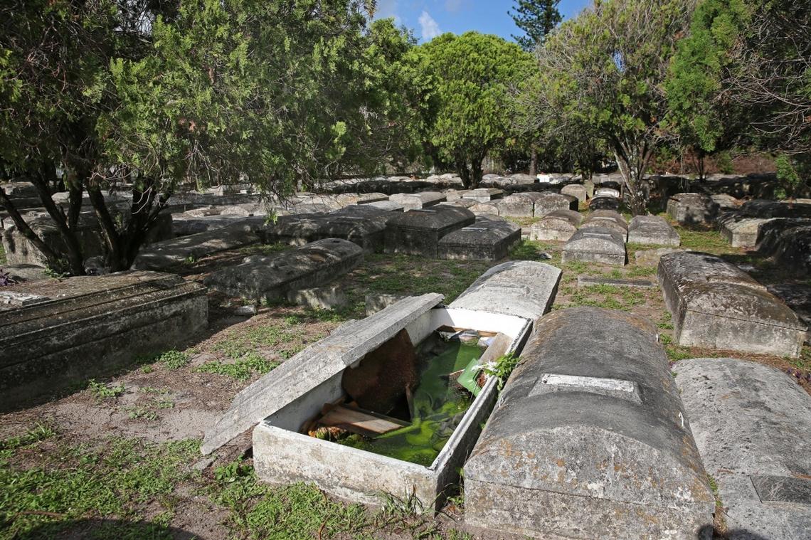 Evergreen Memorial Park Cemetery was recently vandalized when graves were broken into and bones removed. A grave can be seen pried open with most of its contents removed and filled with rain water.Damage to graves and trespassing by drug addicts and Santeria worshippers who deposit offerings are ongoing problems at Miami's oldest graveyards.