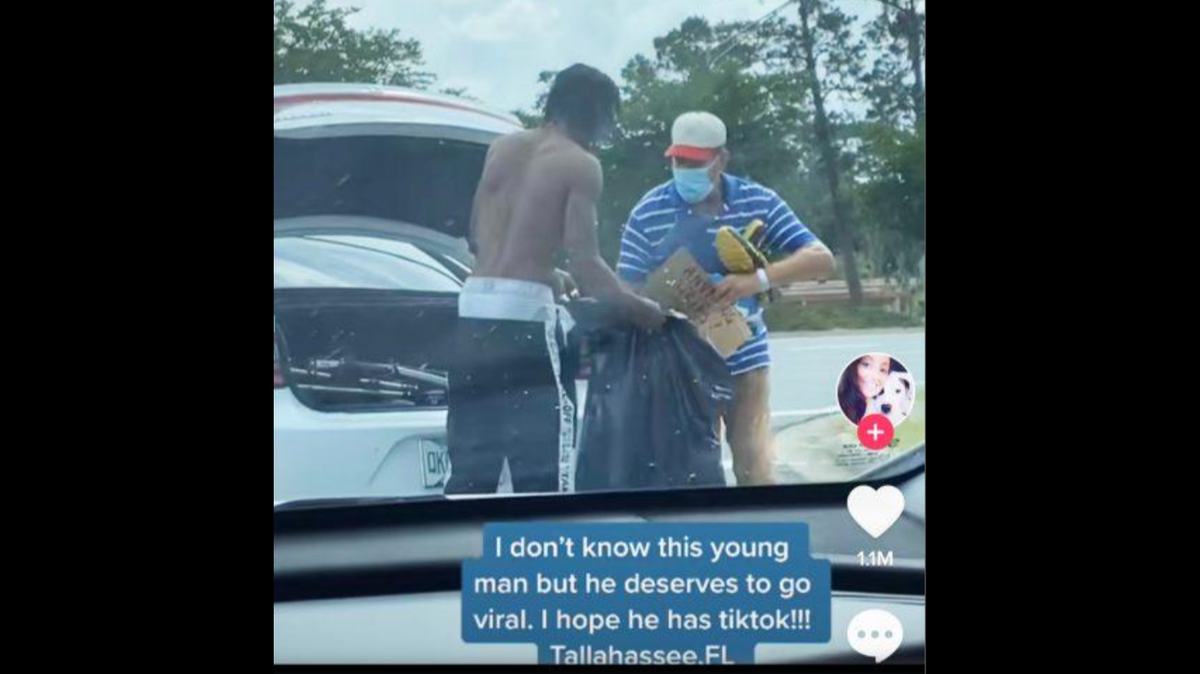 A passerby with the TikTok handle @amburandlex captured video of college student Jabari Richardson helping a homeless man on the side of the road.