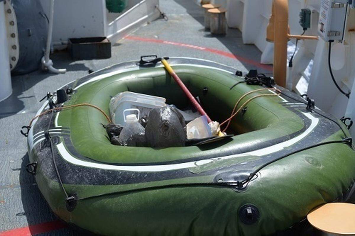 The Coast Guard stopped three Cuban migrants on a green raft about 23 miles southeast of Marathon on Sept. 2, 2021.