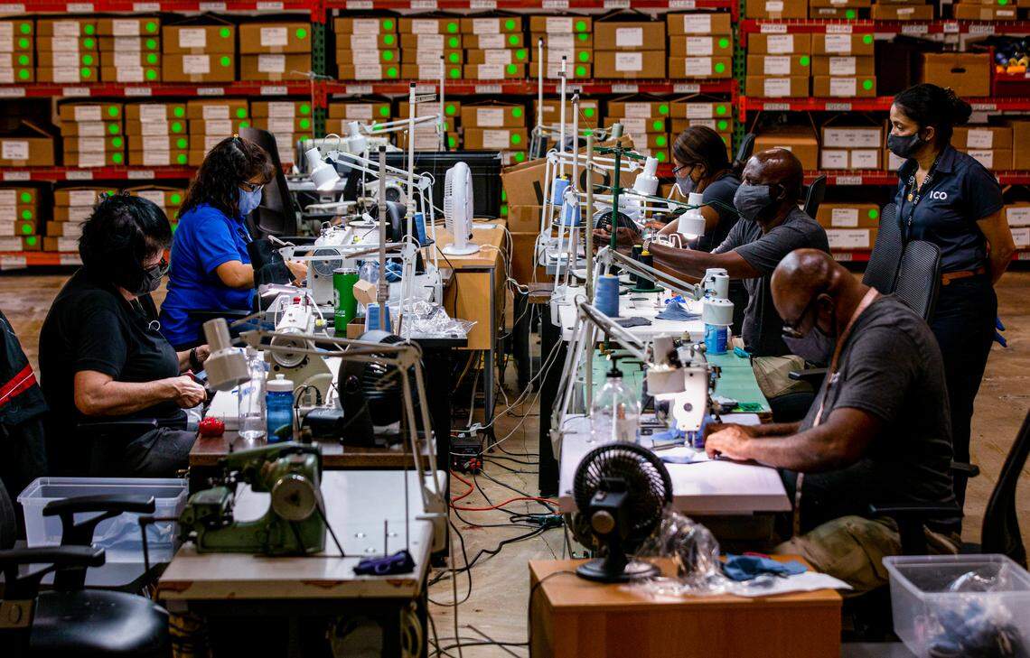 A team of tailors sew nonmedical-grade masks at ICO Uniforms in Miami Gardens, Florida, on Wednesday, April 1, 2020. The uniform manufacturer has begun to produce masks to help protect people in South Florida during the coronavirus pandemic.