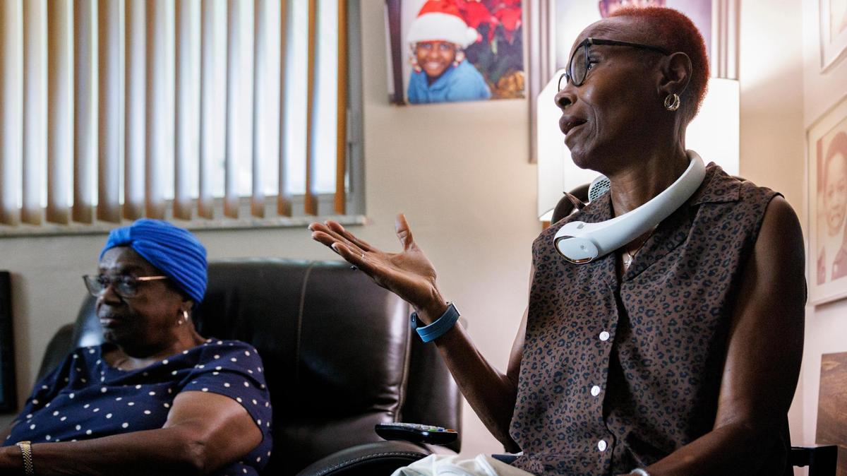 Everlina Chandler, right, speaks to other Little River Farms neighborhood residents about concerns over becoming a city on Tuesday, July 22, 2025, in Miami. 