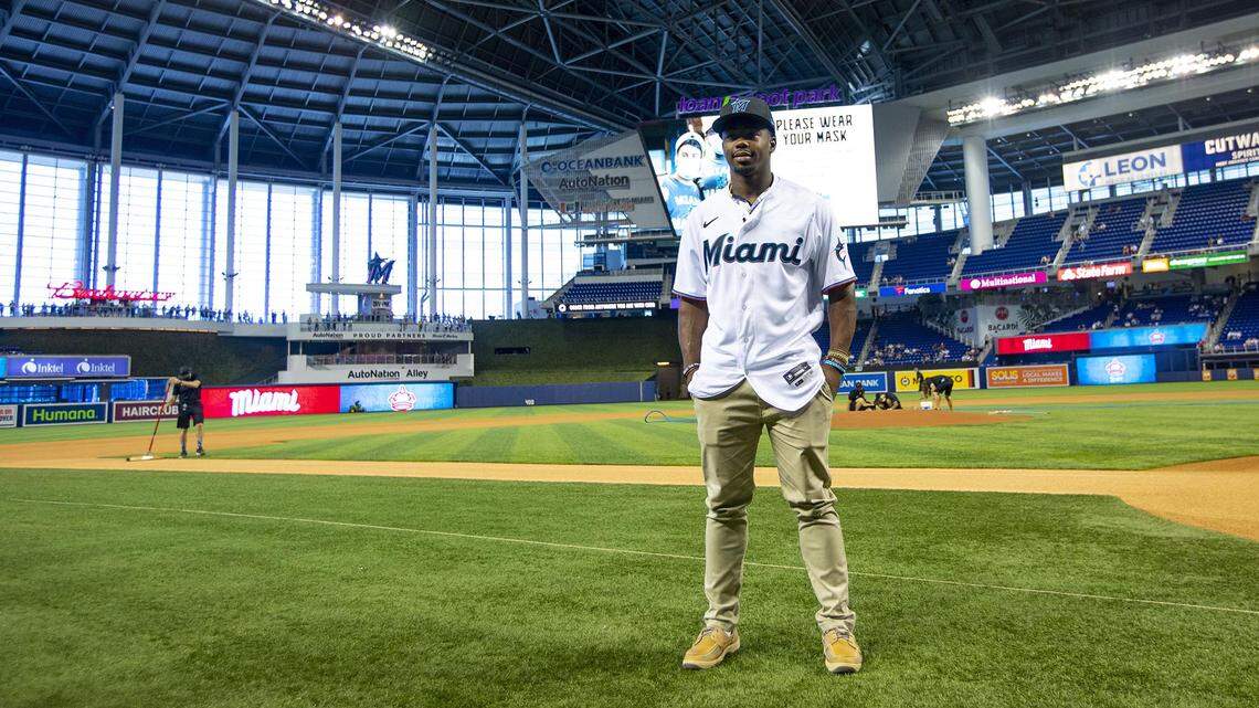 Miami Marlins 16th overall pick in the 2021 Major League Baseball draft, Kahlil Watson, takes a photo on the field before the first inning of an MLB game against the New York Yankees at loanDepot park in the Little Havana neighborhood of Miami, Florida, on Sunday, August 1, 2021.