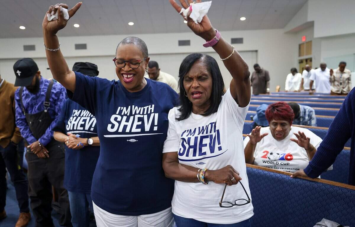 Ronda Greene Celestine, center, and Bloneva Jones, right, mother of Shevrin Jones, pray as members of the Black clergy pray over Florida Sen. Shevrin Jones after he received endorsements from at least a dozen Black clergymen Monday at Greater New Bethel Church in Miami Gardens, in his bid to replace outgoing Congresswoman Frederica Wilson. The show of support follows Wilson's endorsement of former Miami-Dade County commissioner Oliver Gilbert and comes as Jones faces a crowded field of opponents after debating issues such as affordability, education, and federal policy last week.