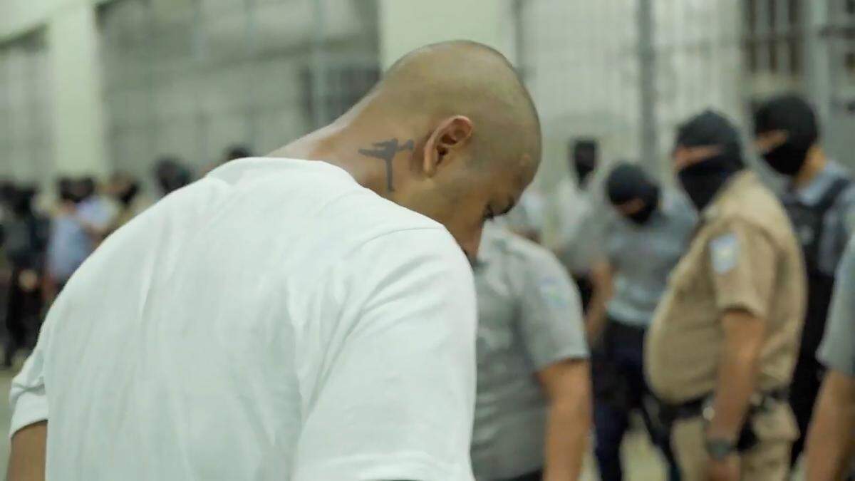A screengrab from a video obtained from the El Salvador Presidential Press Office shows alleged members of the Venezuelan criminal organization Tren de Aragua, deported by the U.S. government, detained at the Terrorism Confinement Center in Tecoluca, El Salvador, on March 16, 2025.