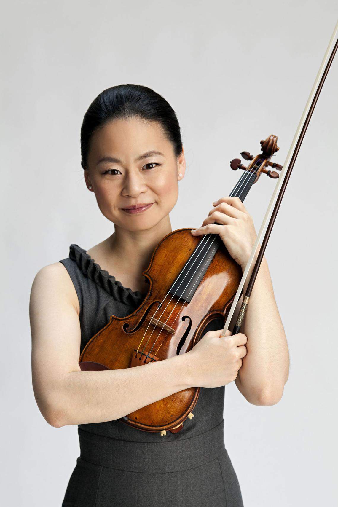 Acclaimed violinist Midori performs at the Kauffman Center next weekend.