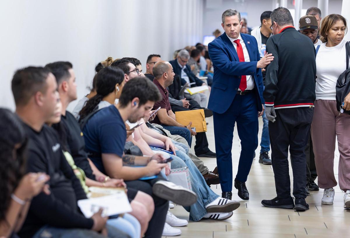 Miami-Dade Tax Collector Dariel Fernandez visits the Miami Central DMV office on Wednesday, April 16, 2025, in Miami.