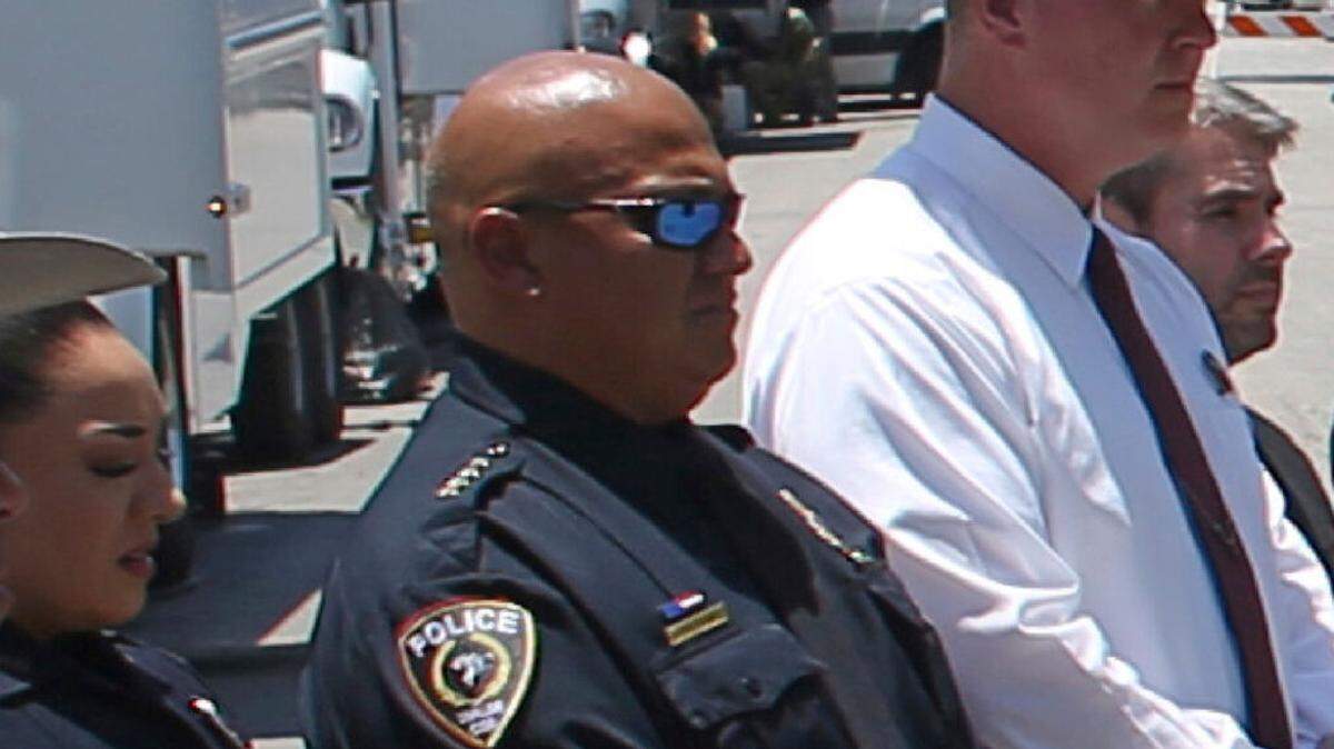 Uvalde School Police Chief Pete Arredondo, center, during a news conference outside Robb Elementary School on May 26.