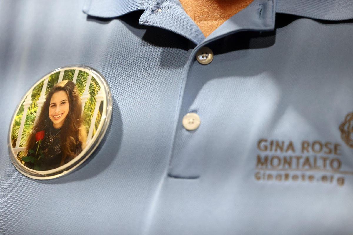 Tony Montalto wears a button bearing an image of his daughter, Gina Montalto, 14, who was killed in the 2018 Marjory Stoneman Douglas High School shootings.