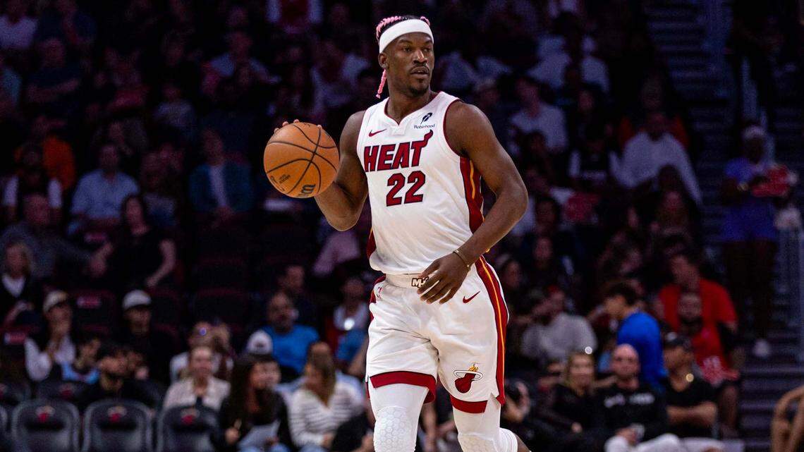 Miami Heat forward Jimmy Butler (22) dribbles up court during the second half of an NBA game at the Kaseya Center on Wednesday, January 1, 2025, in Miami, Fla.