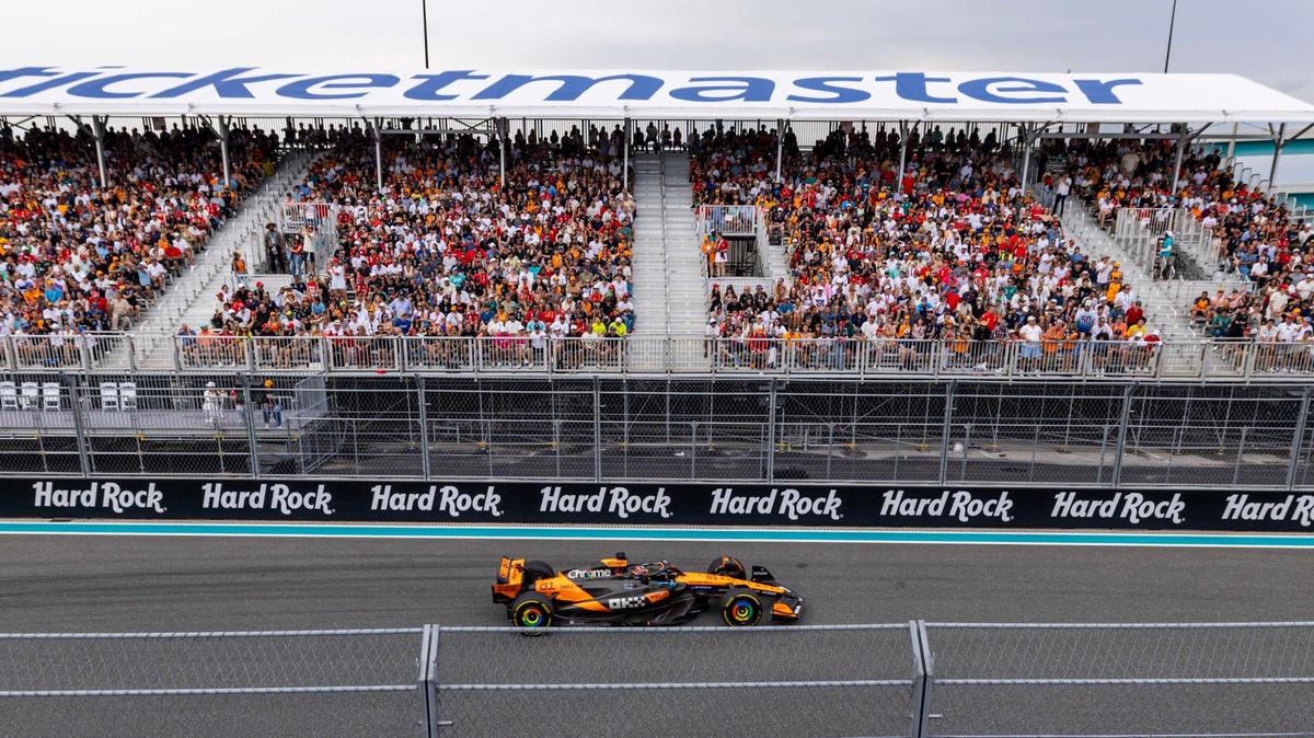 McLaren driver Oscar Piastri of Australia drives past fans on turn 12 during the Formula One Miami Grand Prix at the Miami International Autodrome on Sunday, May 4, 2025, in Miami Gardens, Fla.