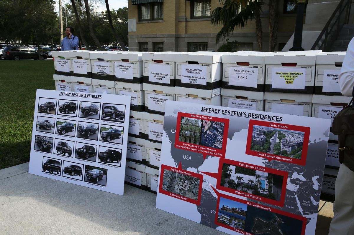 Attorney Brad Edwards displayed decades worth of the case files after a settlement was reached in an Epstein civil case Tuesday, Dec. 4, 2018, in Palm Beach County Court. Epstein issued a public apology to Edwards, through his attorney, acknowledging that the charges he leveled against him were false.