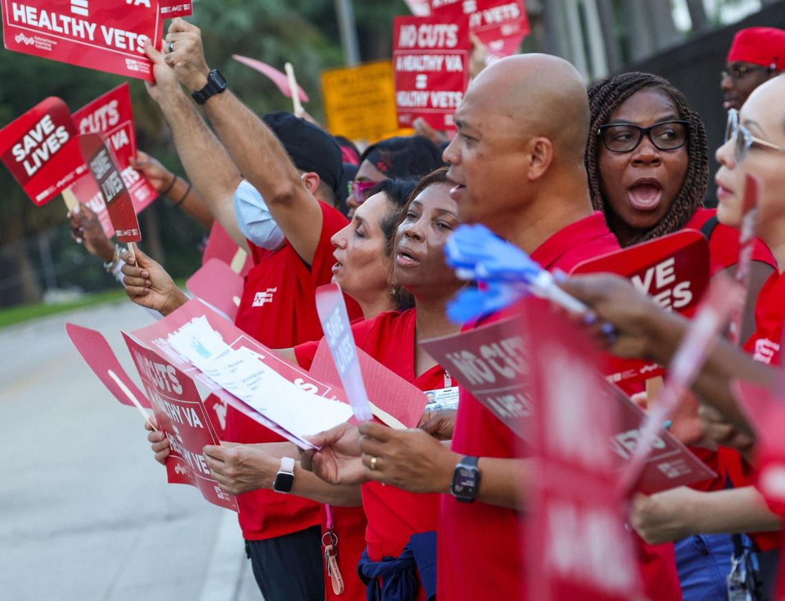 Sixty nurses hold signs as they protest in advocating for increased investment in the VA healthcare system, opposing job freezes and cuts that jeopardize veterans’ access to medical care. The demonstration, supported by the National Nurses United Union at the Miami VA Hospital, was part of a nationwide effort calling for enhanced funding for veterans’ healthcare services on Wednesday, August 21, 2024, in Miami, Florida.