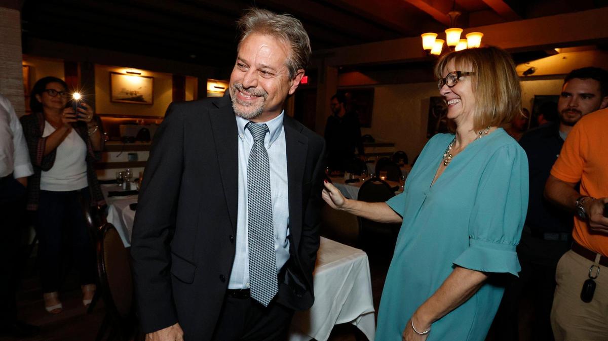 Candidate Miguel Gabela celebrates as Miami-Dade County Commissioner Eileen Higgins reacts after he wins the District 1 seat on the Miami City Commission during his election night results party at the 94th Aero Squadron Restaurant on Tuesday, November 21, 2023.