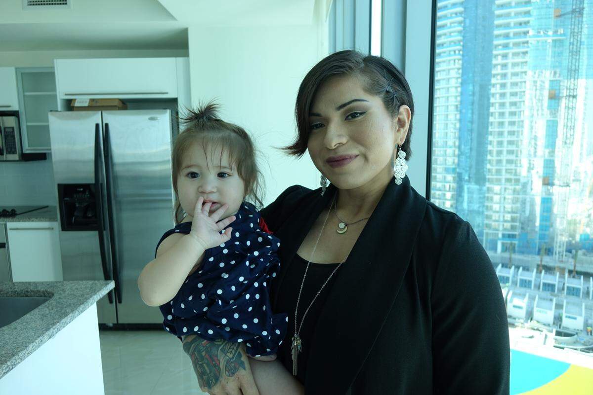Rebecca Sanders, a member of the Miccosukee tribe, holds her baby, Ingrid. Nearly a year ago, a tribal court ordered Ingrid removed from her mother, days after she was born. Tribal police took the child from her at Baptist Hospital. Sanders is now suing tribal members, the hospital and Miami-Dade County.
