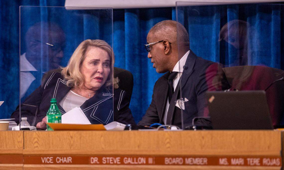 Miami-Dade Public Schools board members Chair Perla Tabares Hantman and Vice Chair Dr. Steve Gallon III confer during Wednesday’s school board meeting, January 12, 2022.
