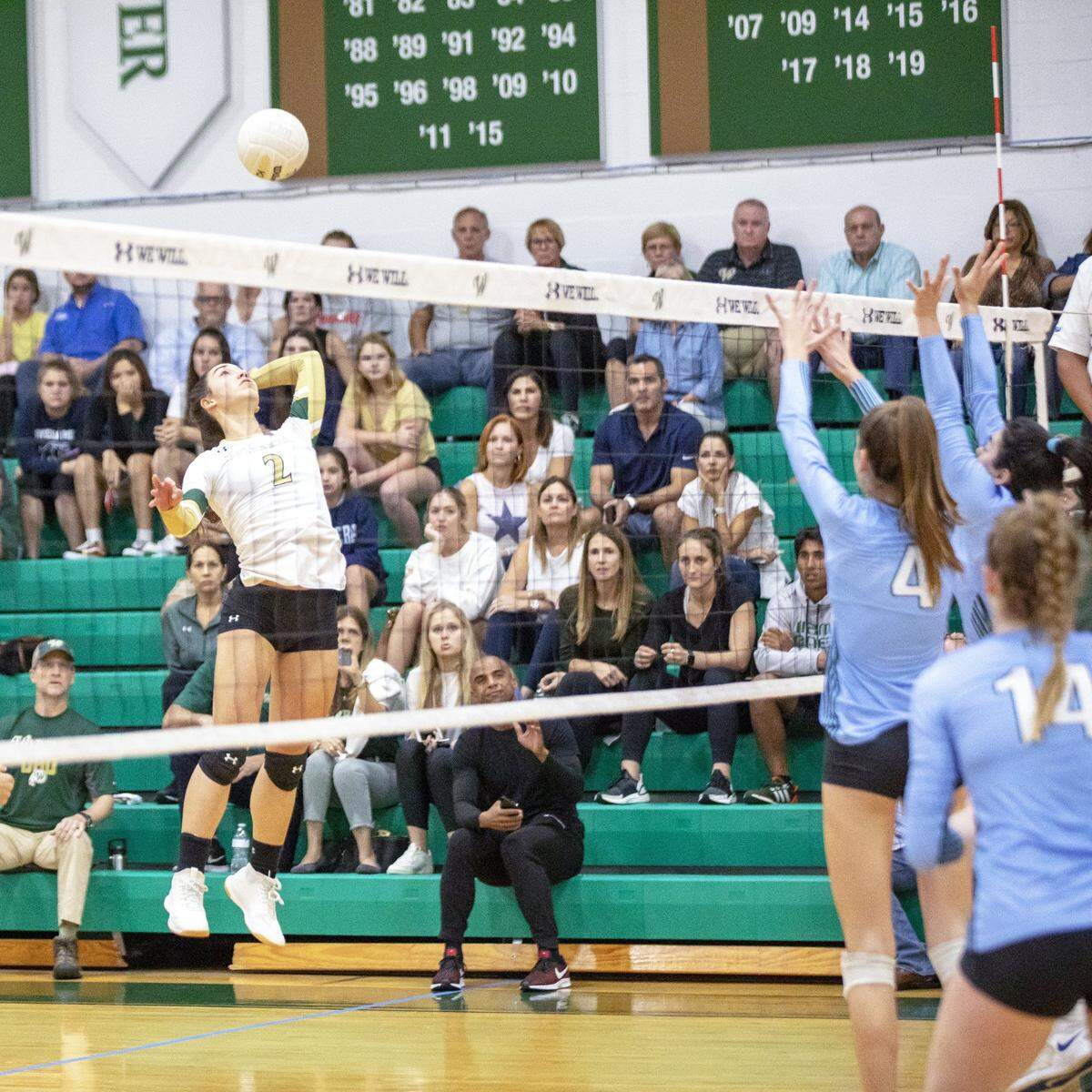 Westminster Christian School outside middle Saskia Hernandez (2) attempts to spike the ball during the volleyball Region 4-3A finals against Ransom Everglades School last year.