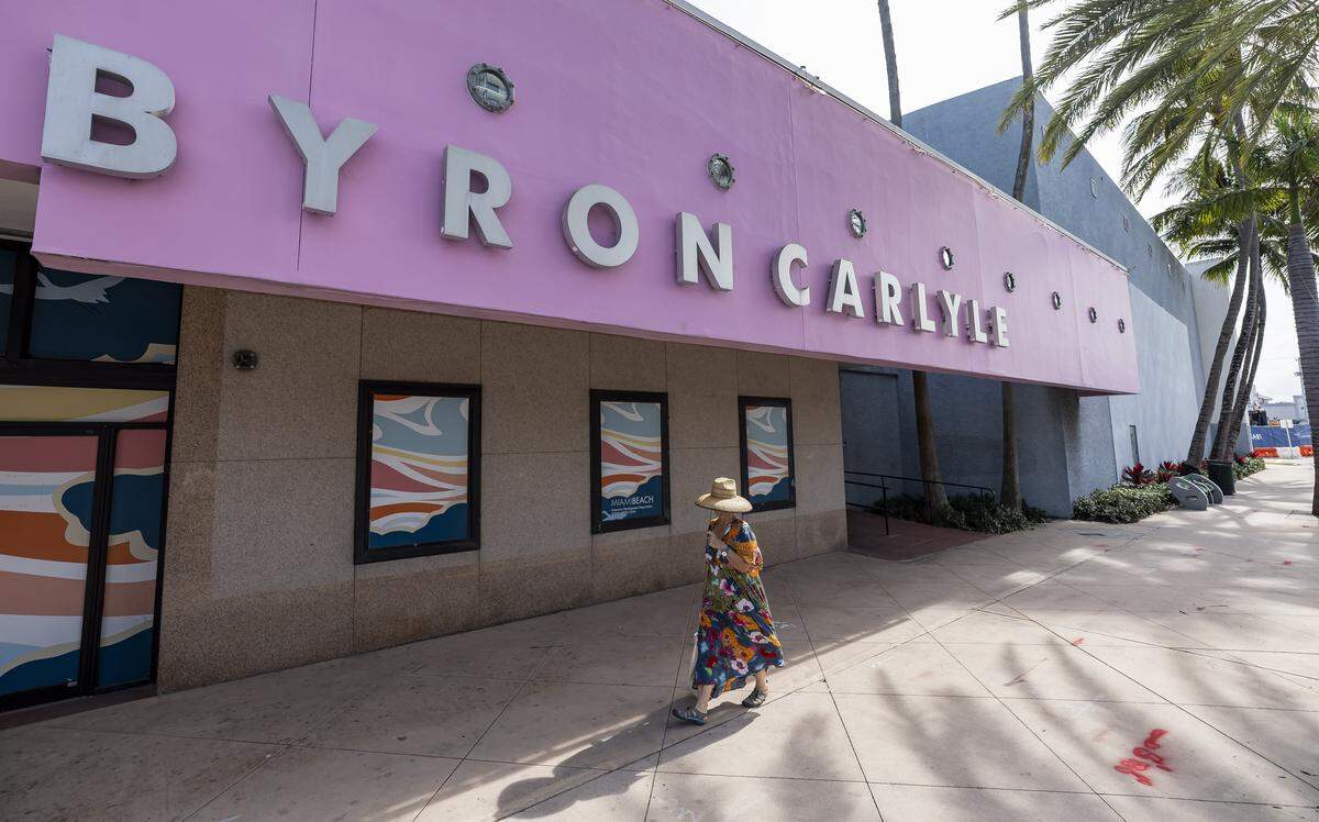 A person makes their way past the Byron Carlyle Theatre in North Miami Beach on Tuesday, May 5, 2026, in Miami Beach, Fla.