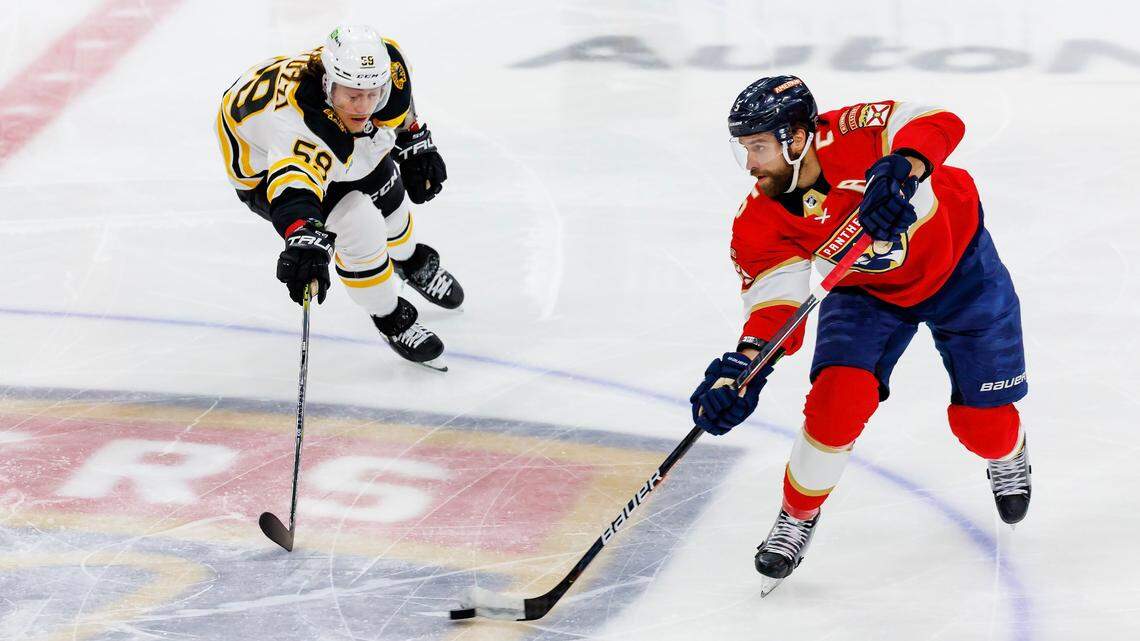 Florida Panthers defenseman Aaron Ekblad (5) carries the puck against Boston Bruins left wing Tyler Bertuzzi (59) during the first period of Game 3 of a first round NHL Stanley Cup series at FLA Live Arena on Friday, April 21, 2023 in Sunrise, Fl.