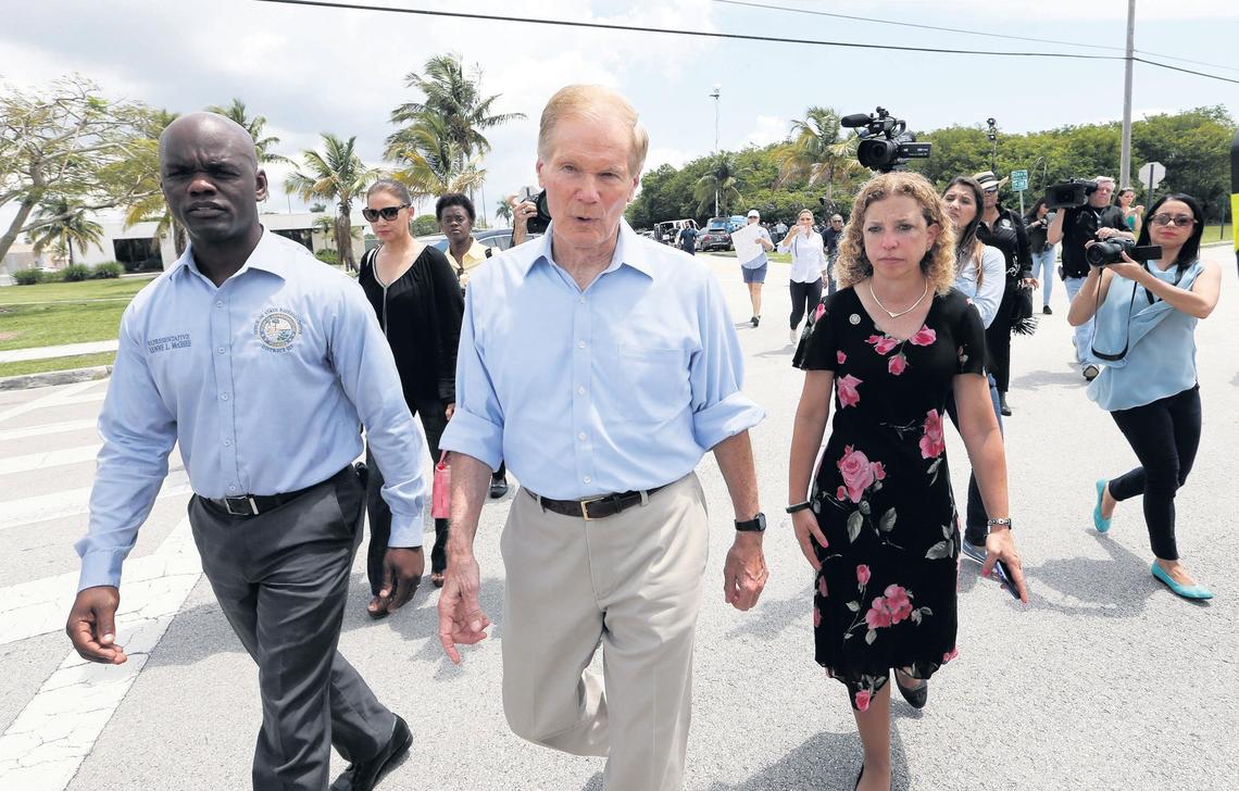 U.S. Sen. Bill Nelson (D-FL), center, walks with U.S. Rep. Debbie Wasserman Schultz (D-FL), and Florida House Rep. Kionne L. McGhee to the entrance before being denied access to visit the Homestead Temporary Shelter For Unaccompanied Children on June 19, 2018, in Homestead, Florida.