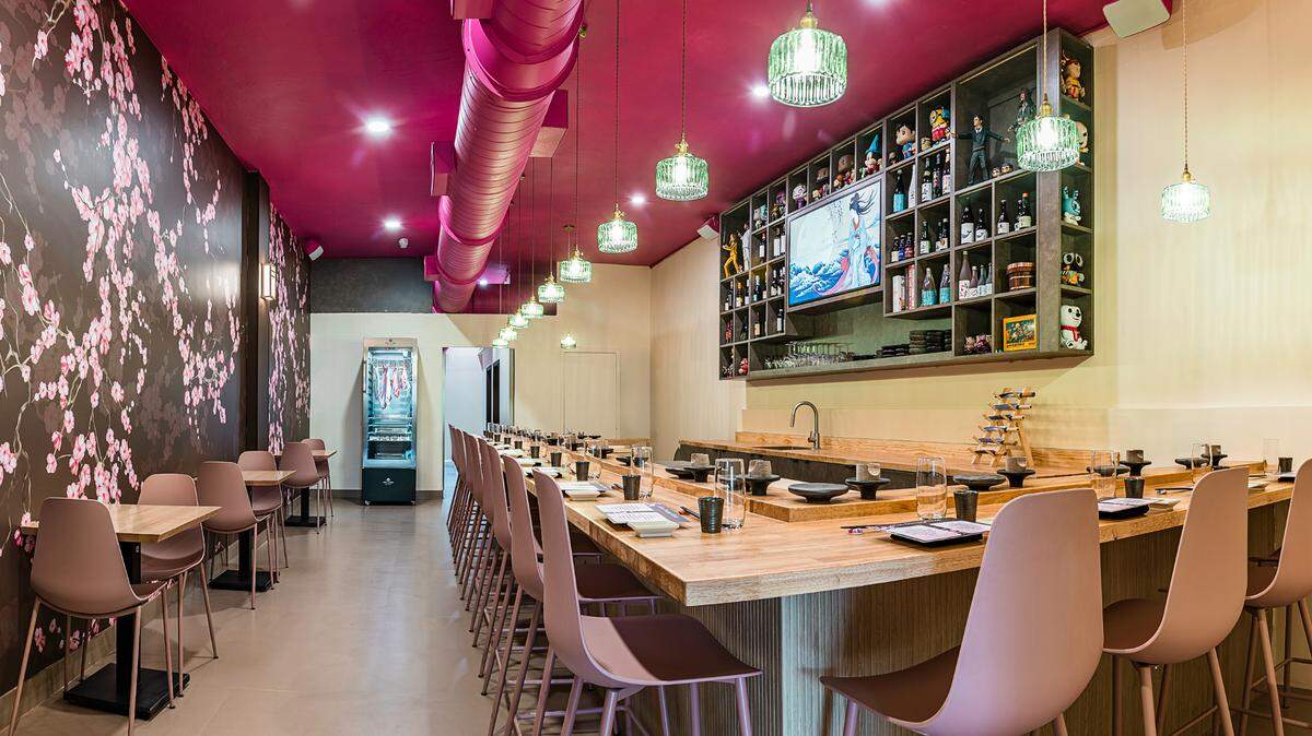 Pink chairs and a magenta ceiling at Miss Crispy Rice in Coral Gables, which has opened in the former space of Caja Caliente.