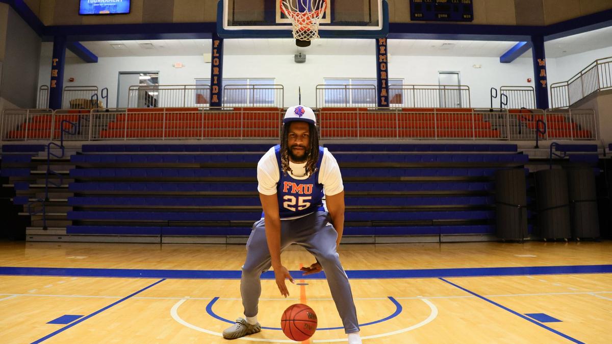 Florida Memorial University basketball player and Miami Pro League star Latavious Mitchell, 26, of team Draft City, dribbles the basketball inside the Florida Memorial University Wellness Center at 15800 NW 42nd Ave. in Miami Gardens, Florida, on Friday, Aug. 30, 2024.