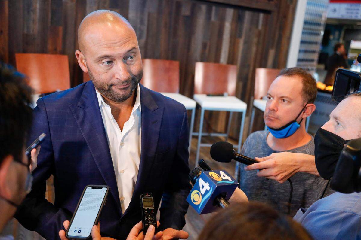 Miami Marlins CEO Derek Jeter talks to reporters after announcing the signing of the new Miami Marlins outfielder Avisaíl Garcia and a contract extension for starting pitcher Sandy Alcántara during a press conference at the Biscayne Bay Brew Hall of loanDepot park in Miami, Florida, Wednesday, December 1, 2021.