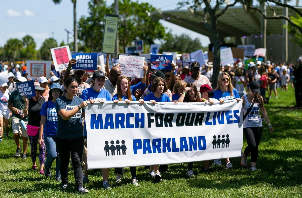 Protestors participate in the March For Our Lives rally at Pine Trails Park on Saturday, June 11, 2022 in Parkland, Fla. One of the main goals of the rally is to increase pressure on politicians to pass laws that help prevent gun violence.