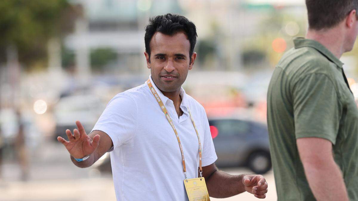 Republican Presidential candidate Vivek Ramaswamy waves as he exits from the Knight Concert Hall prior to the Republican Presidential Primary debate at the Adrienne Arsht Center for the Performing Arts on Wednesday, Nov. 8, 2023 in Miami, Florida.