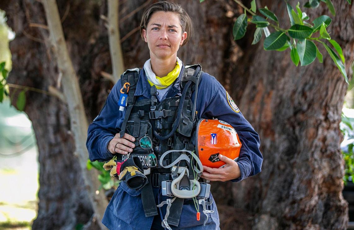 Battalion Chief Nichole Notte, Broward Sheriff Fire Rescue, Urban Search and Rescue-Florida Task Force, talks to Miami Herald reporter Alex Harris about her experiences working on the search and rescue mission at the site of the collapsed 12-story oceanfront condo, Champlain Towers South, in Surfside, on July 8, 2021.