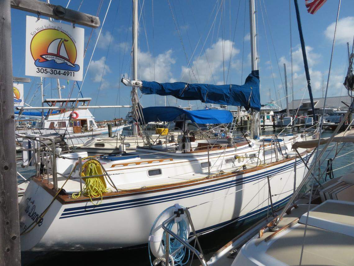 The yacht is docked at an inconspicuous dock in Key West.