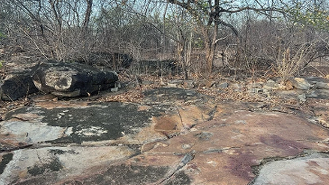 On a rock outcropping in Brazil, prehistoric impressions on the stone were surrounding by rock carvings, researchers said.