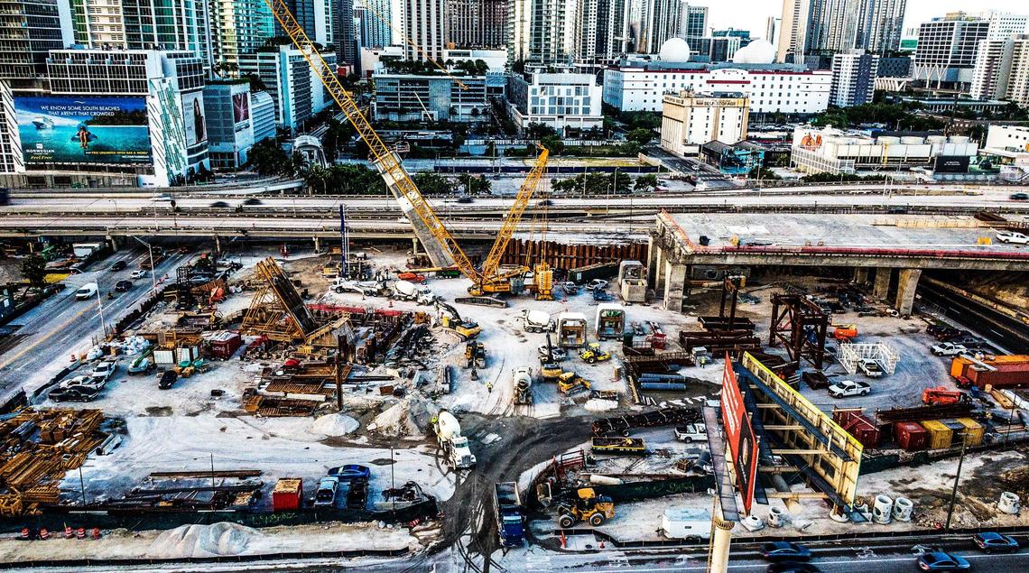 Southeast view of ongoing construction of two arches and the center pier footer for the I-395 signature bridge as part of the I-395/SR 836/I-95 Design-Build Project, on Wednesday, Aug. 3, 2022.