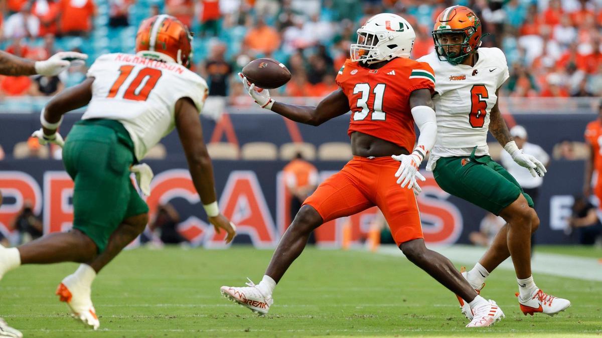 Miami Hurricanes linebacker Wesley Bissainthe (31) intercepts the ball in the first quarter during the game against the Florida A&M Rattlers at Hard Rock Stadium in Miami Gardens, Florida, on Saturday, September 7, 2024.