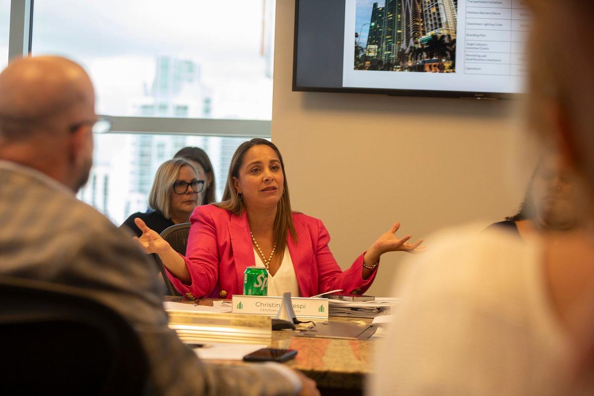 Christina Crespi , CEO and executive director of the Miami Downtown Development Authority, talks during a Sunshine Meeting at the DDA’s office in downtown Miami. About 60 business owners, residents, and leaders gathered Saturday to discuss improvements made in the urban core and lingering concerns.