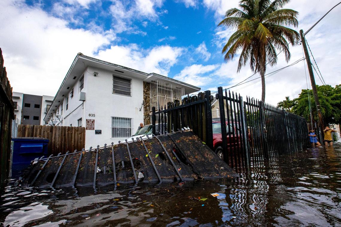A house surrounded by floodwaters on Southwest Third Street in the Little Havana neighborhood of Miami, Florida, on Saturday, June 4, 2022.