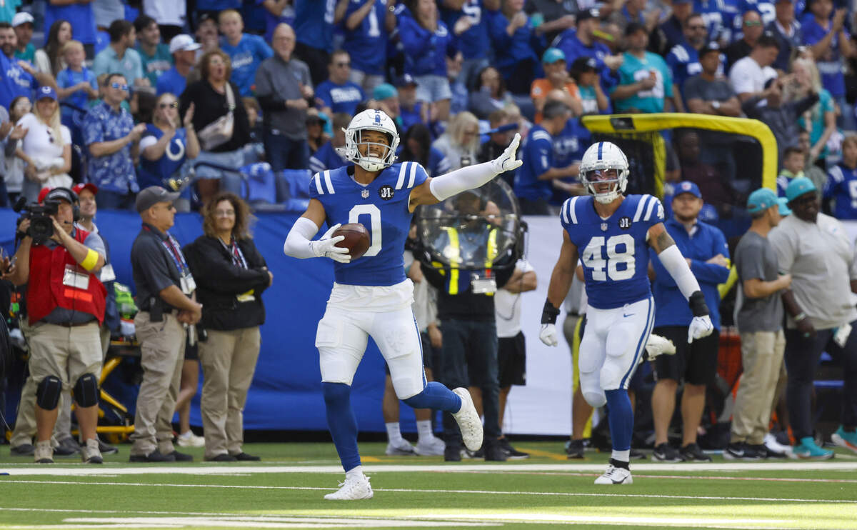 Indianapolis Colts safety Cam Bynum (0) celebrates after intercepting Miami Dolphins quarterback Tua Tagovailoa (1) during the first half of an NFL game at Lucas Oil Stadium on Sunday, Sept. 7, 2025, Indianapolis, Indiana.