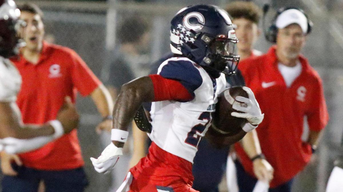 Columbus Explorers Shaddai Carter (27) gains yardage during the football game against Norland Vikings on Friday, October 20, 2023 at Traz Powell Stadium in Miami.