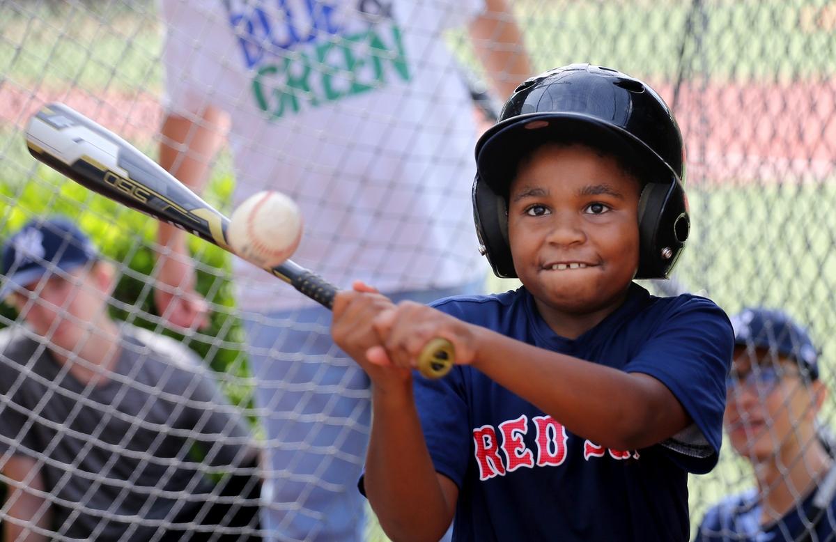 Garth Fowler, 9, focuses on hitting the ball at Pelican Park in Sunny Isles Beach on Sunday, Nov. 4, 2018.