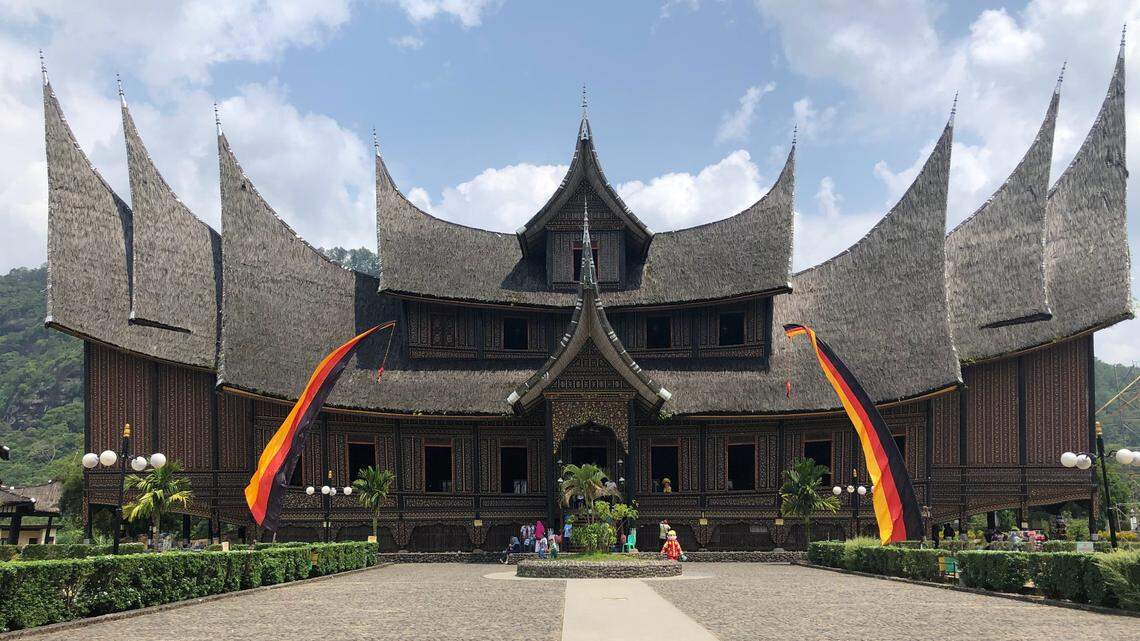 Scientists found a “common” animal stuck to walls in Indonesia and discovered a new species, a study said. Photo shows a representative building in Sumatra Barat with the gonjong roof style of the Minang people .