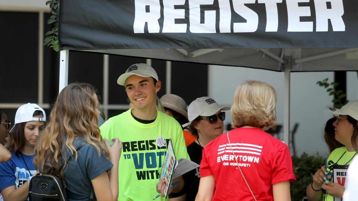 Davis Hogg helps register voters in Tallahassee. Students and supporters from the March For Our Lives movement gathered as the Road to Change bus tours, both national and state, meet in Tallahassee for a rally to gather support and register voters.