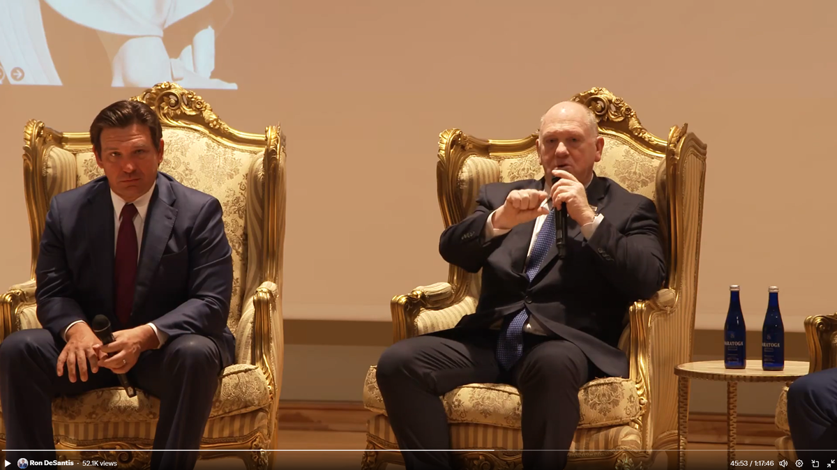 Florida Gov. Ron DeSantis (L) and Trump administration border czar Tom Homan speak on a panel at New College of Florida on March 20, 2025.